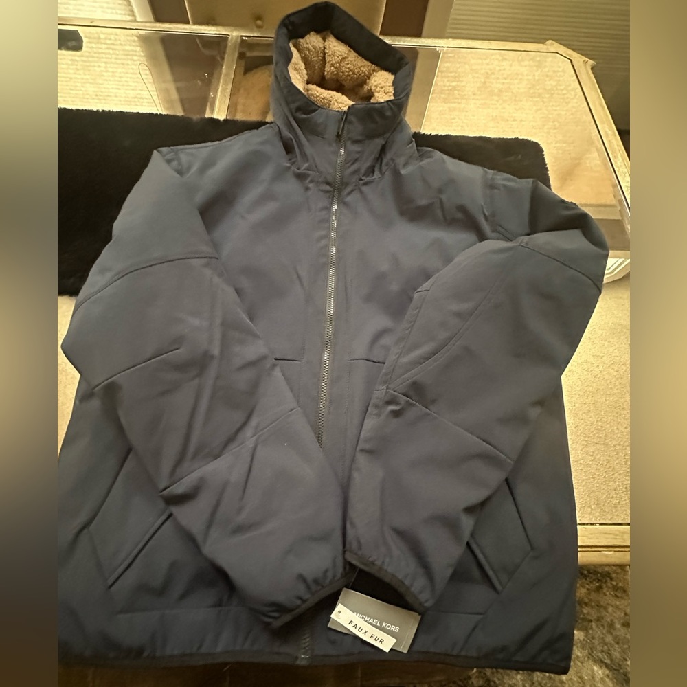 Brand new with tag Michael Kors, winter coat, with furry hood, orange interior
